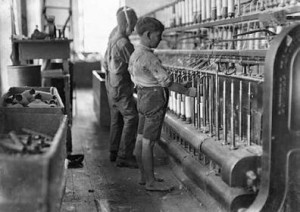 10-25-15-Child laborer in a spool mill