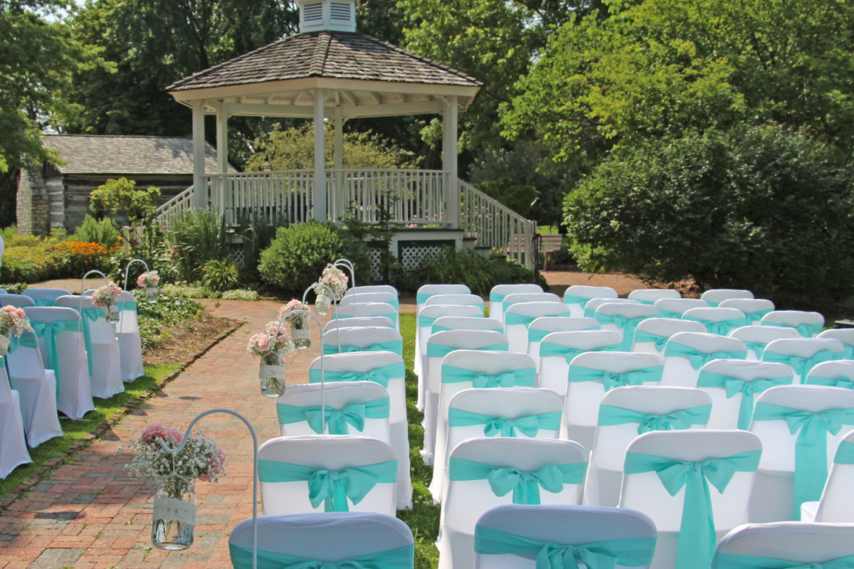 Seating for an outside wedding by the Gazebo