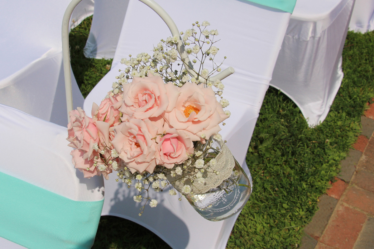 Outside decorations on the chairs for a wedding or anniversary