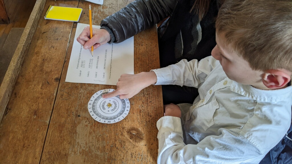 Spies, Lies and Mysteries Family Program - using cipher to decode secret message